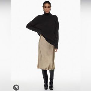 Babaton for Aritzia size 10 midi-length abstract print satin slip skirt.